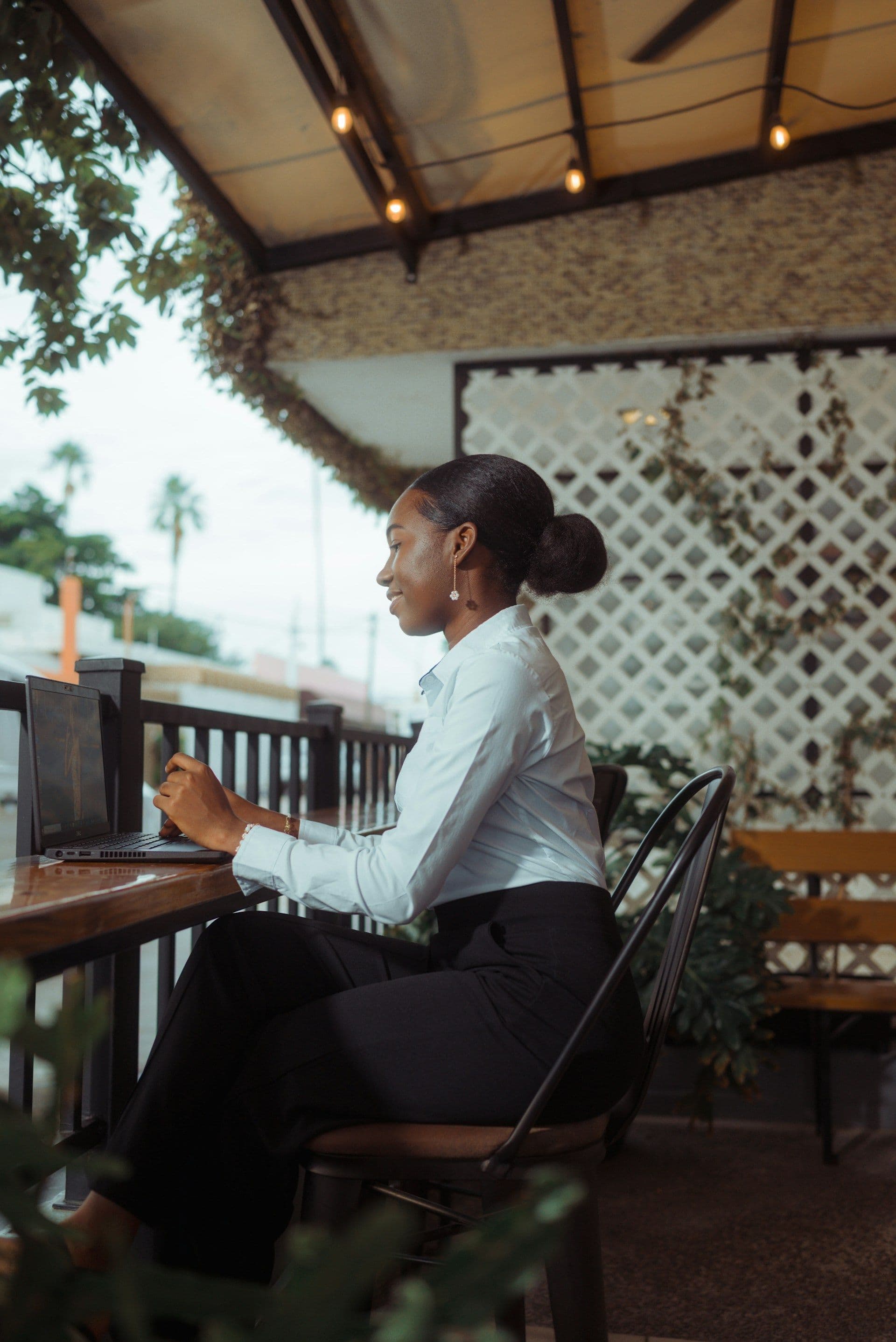 Small business owner reviewing a financial dashboard on screen