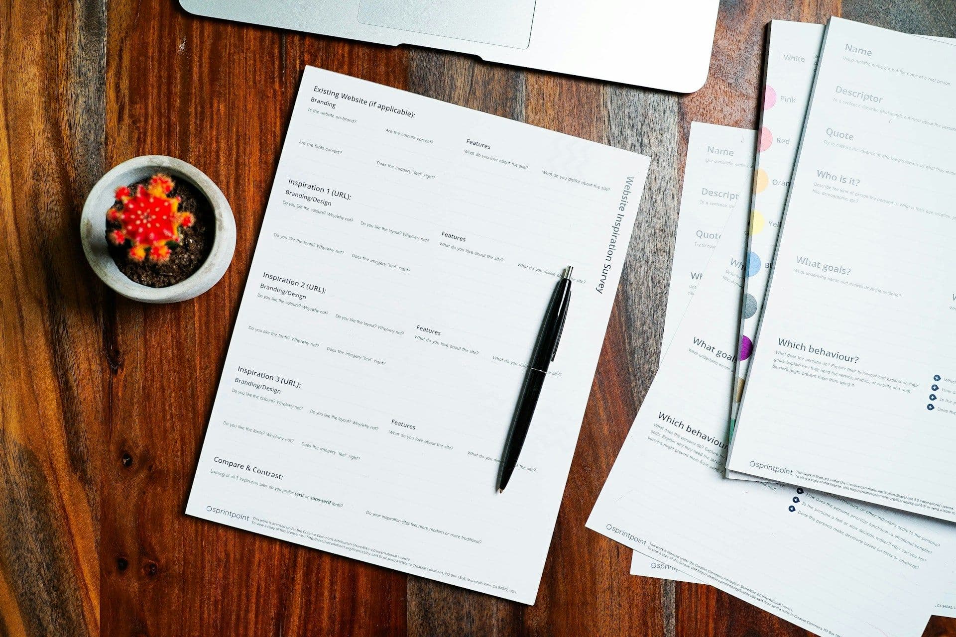Loan schedule paperwork spread on a desk