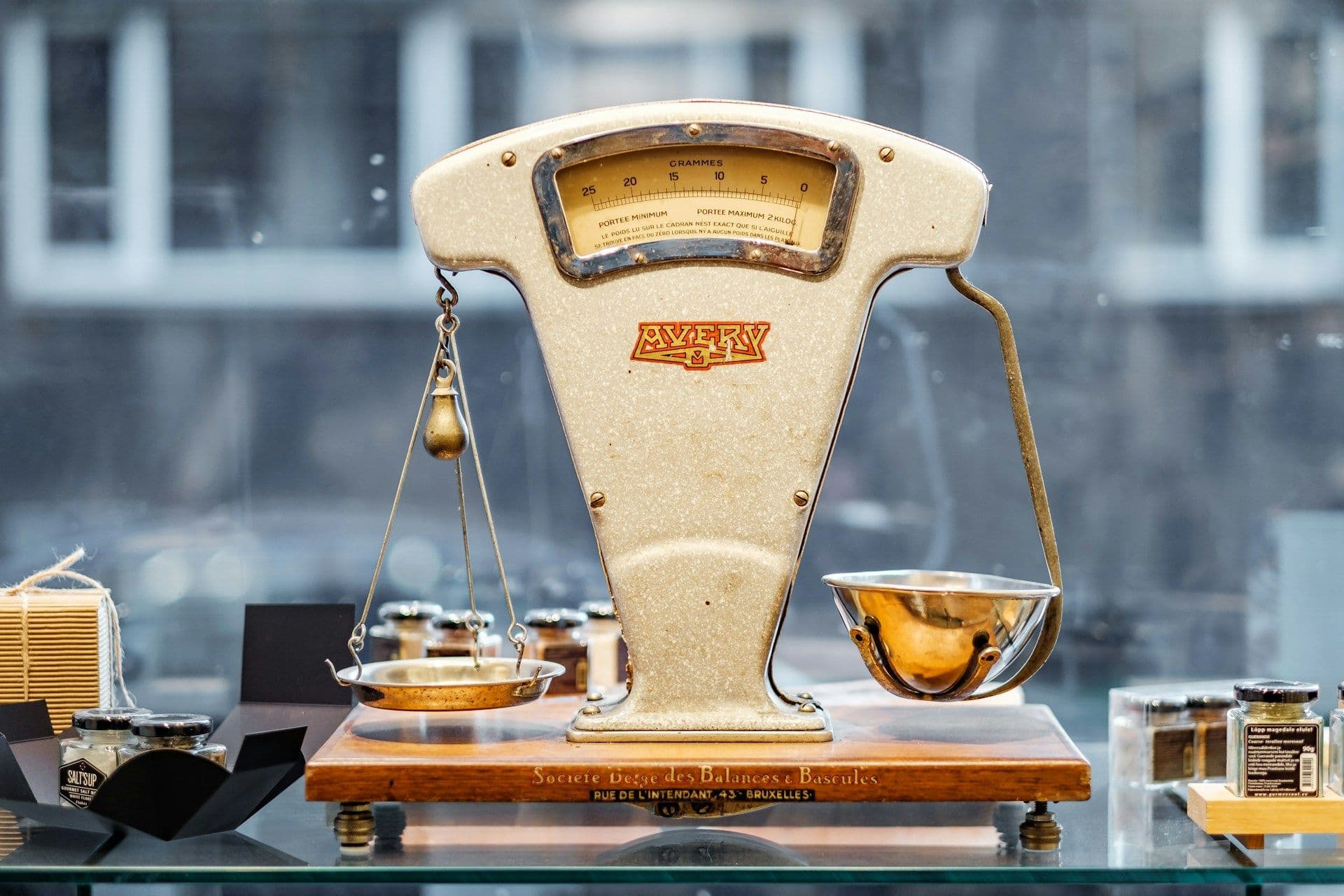 A balance scale — assets weighed against liabilities and equity