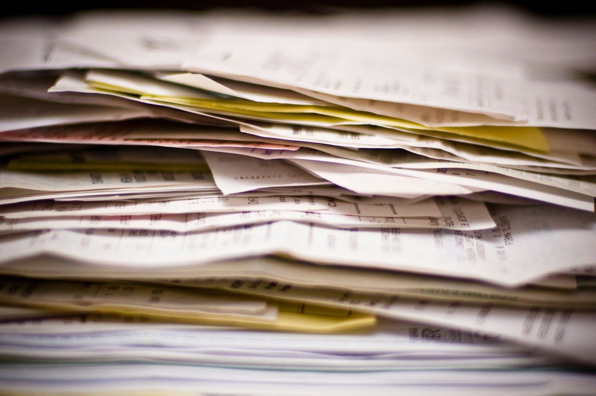 Pile of receipts being organized
